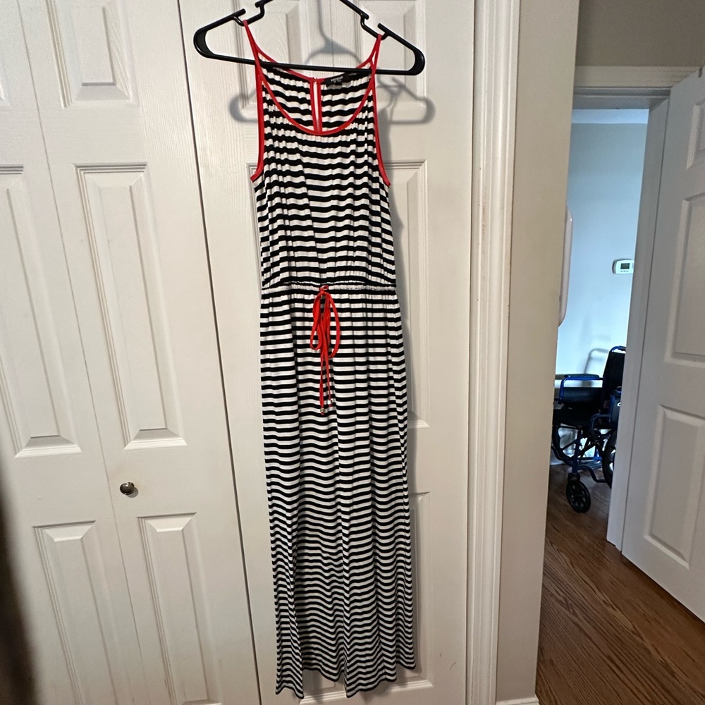 Comfortable black and white striped with red details. Size small maxi dress.